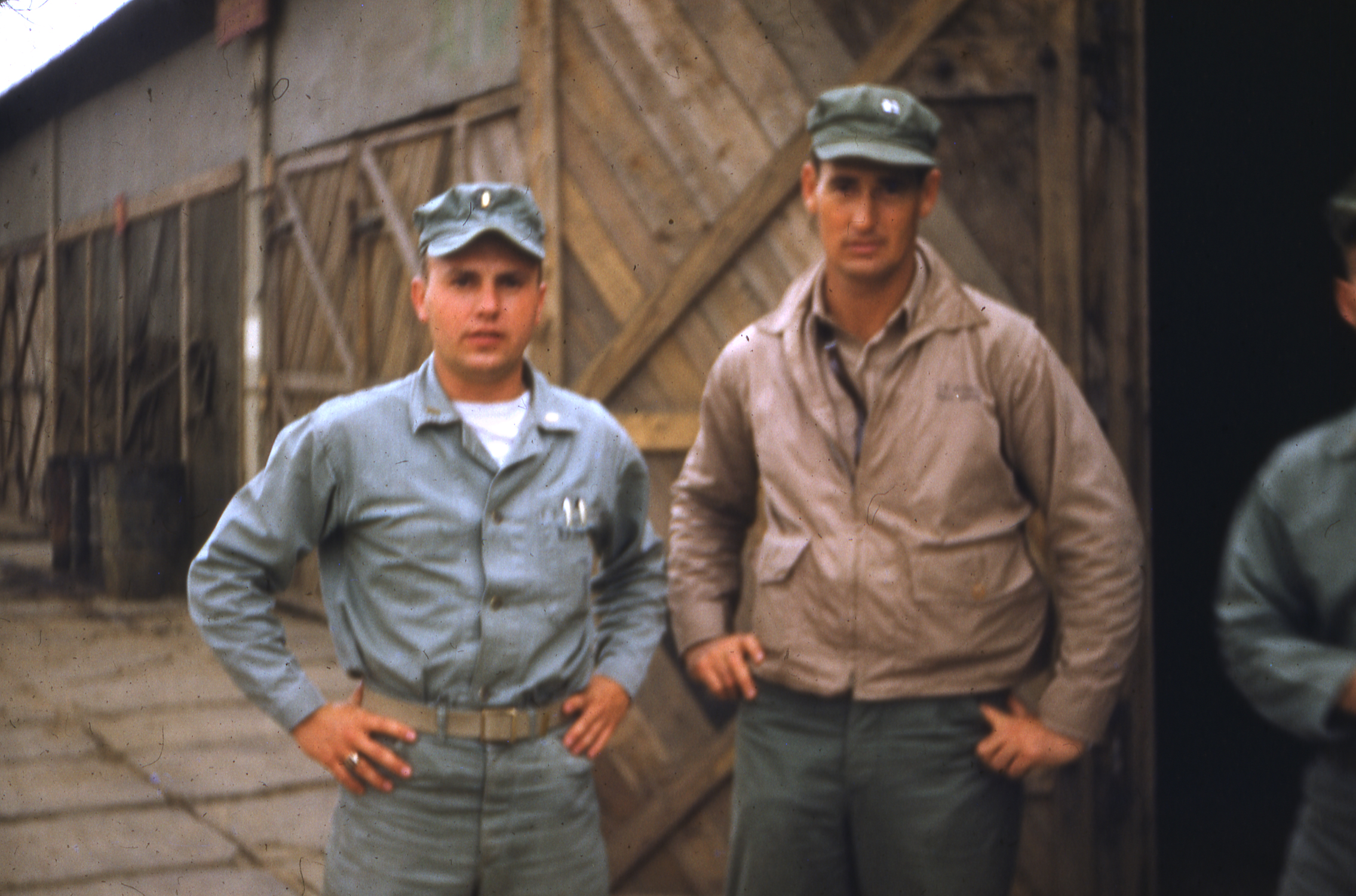 Marine Lieutenant Edwin L. Arnold, Sr., posing with Marine Captain, fighter pilot, and American baseball player manager Ted Williams after he crash-landed his Navy F9F Panther jet following a mission in Korea, circa February 19, 1953.